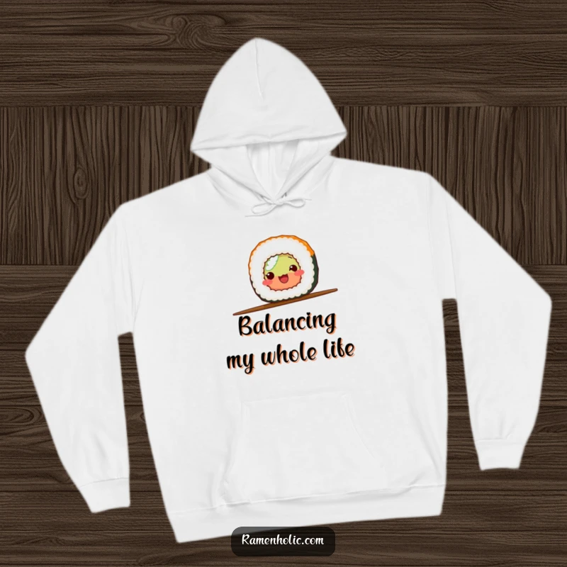 Funny sushi roll performing a balancing act on a chopstick, printed on a cozy hoodie for warmth and humor.