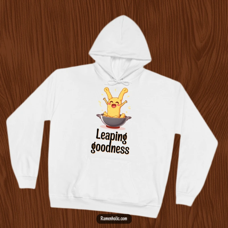 Funny tempura piece joyfully leaping out of a wok, designed on a comfortable, warm hoodie.