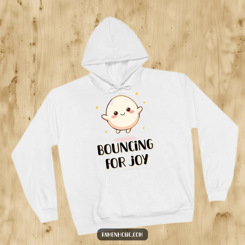 Funny Mochi Bounce Hoodie featuring a happy mochi character in a bouncy pose, ideal for warmth and cheerful vibes.